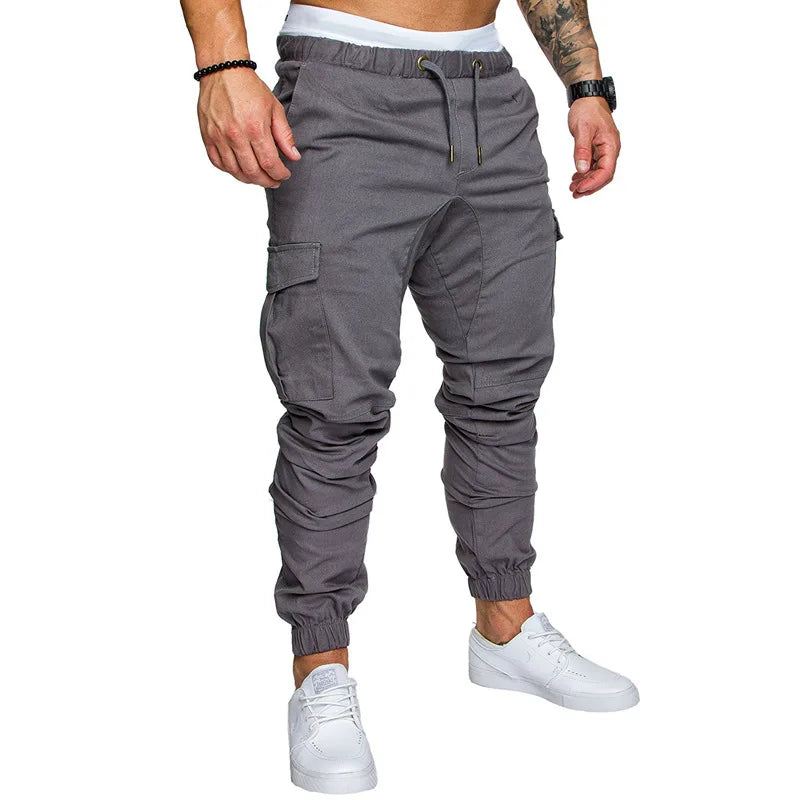 Calças masculinas finas moda casual jogger calças 2020 streetwear calças de carga multi-bolsos calças de fitness ginásios moletom dos homens